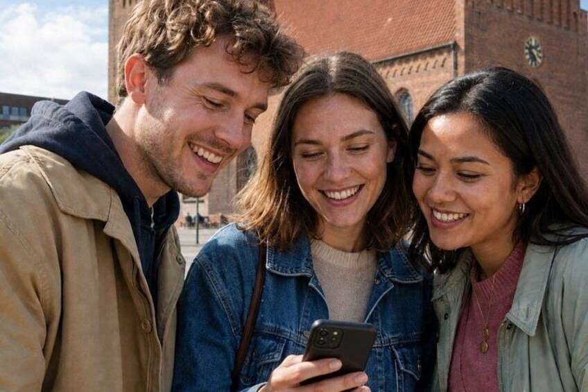Three people looking at a smartphone. 1