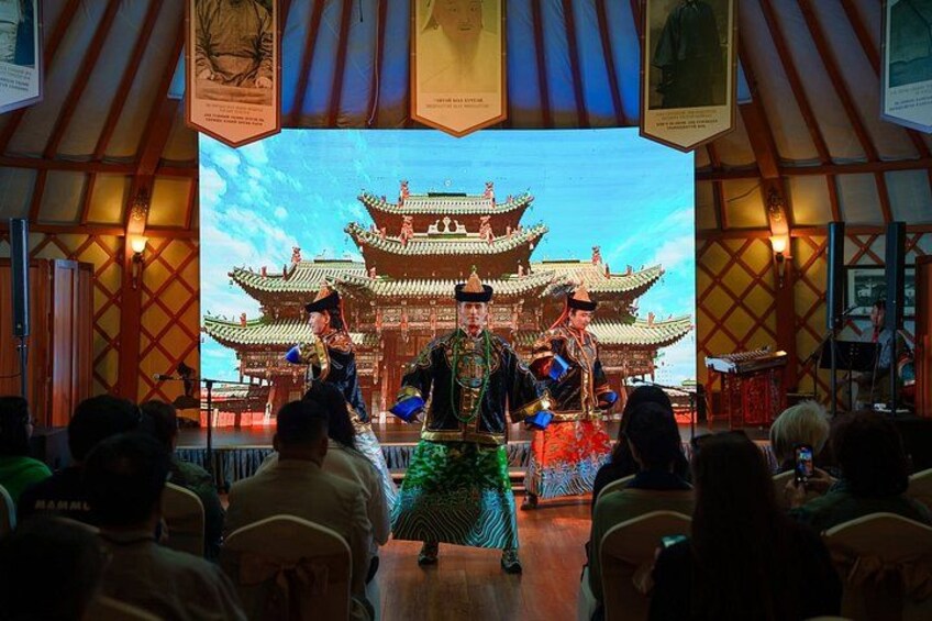 A traditional Chinese opera performance with actors in elaborate costumes on a stage with a backdrop of a Chinese temple. 5