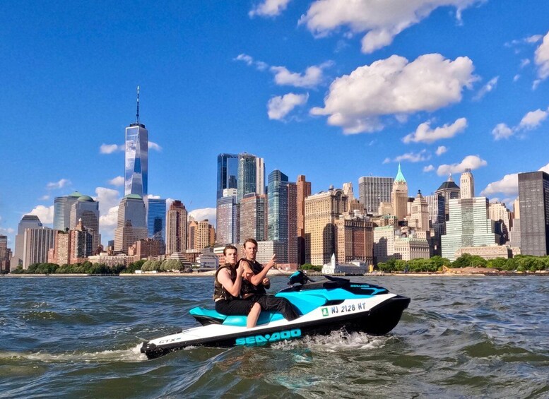 A jet ski on water with a city skyline in the background. 3