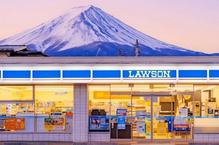 A Lawson store with a view of Mount Fuji in the background. 1