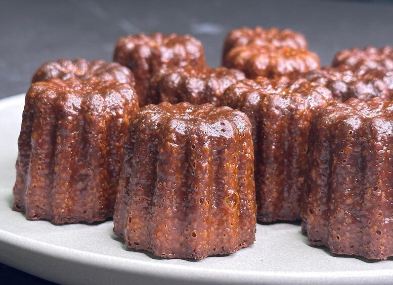 A plate of caramelized desserts with a glossy, textured surface. 2