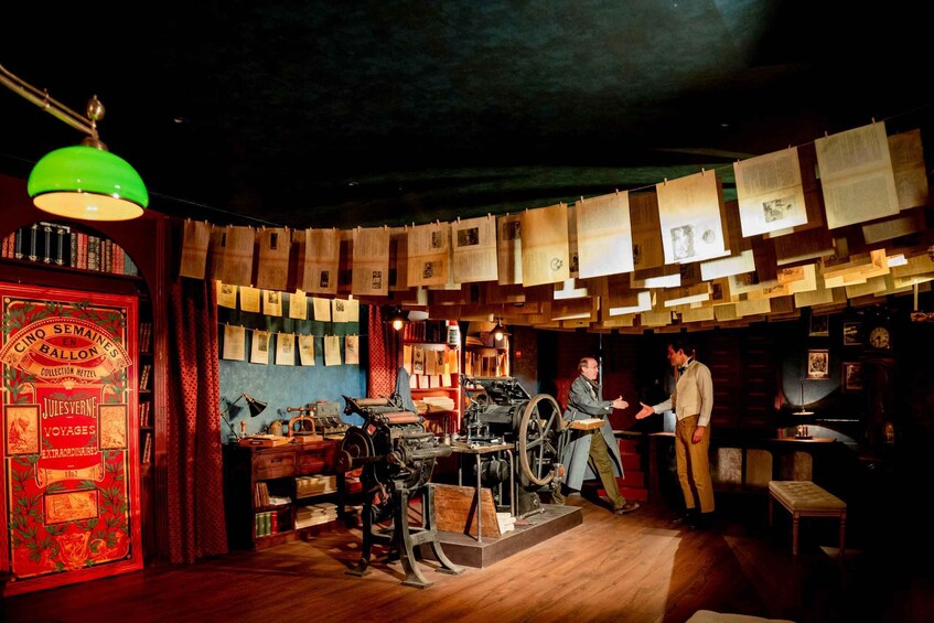 A vintage bookshop with wooden shelves, a typewriter, and a man reading a book. 5