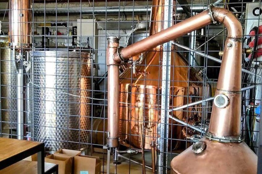 A copper distillation apparatus in a laboratory setting. 5