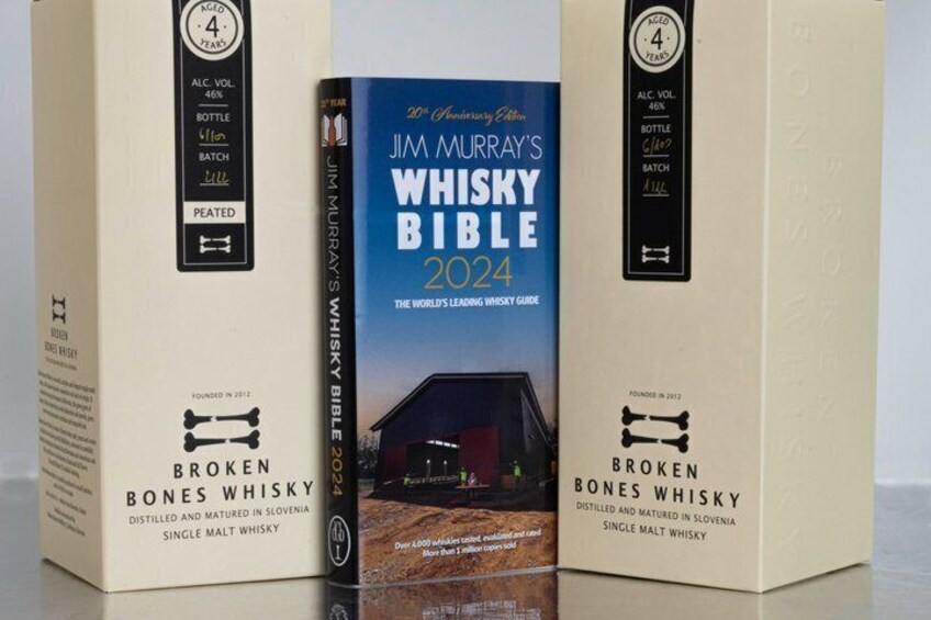 Three books titled 'Jim Murray's Whisky Bible 2024' and 'Broken Bones Whisky' with labels indicating alcohol volume, bottle size, batch size, and whether they are peated. 4