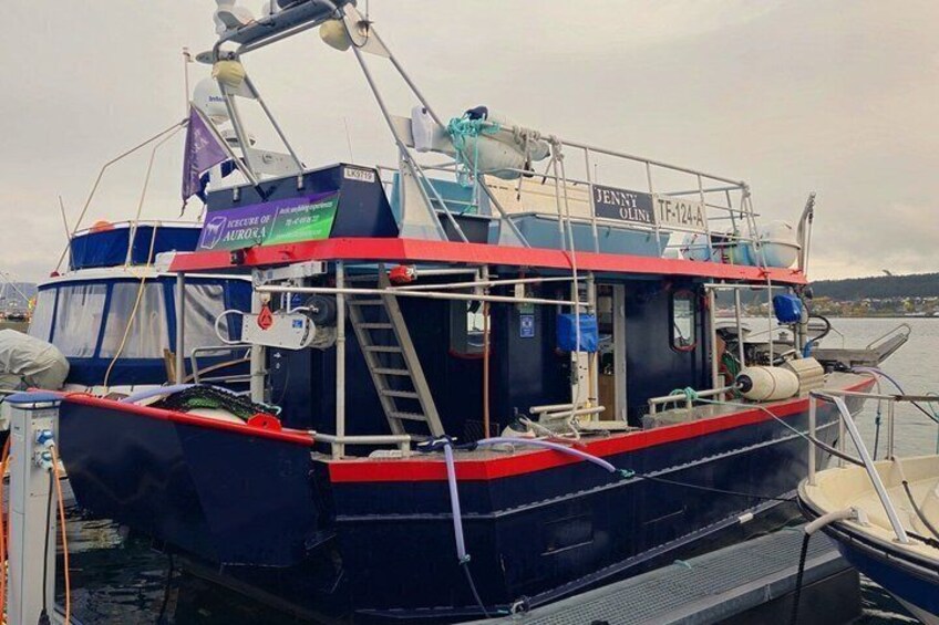 A fishing boat named 'Jenny Gill' docked at a marina. 3