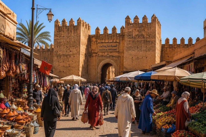 A bustling market street with vendors and shoppers, a historic gate, and traditional architecture. 3