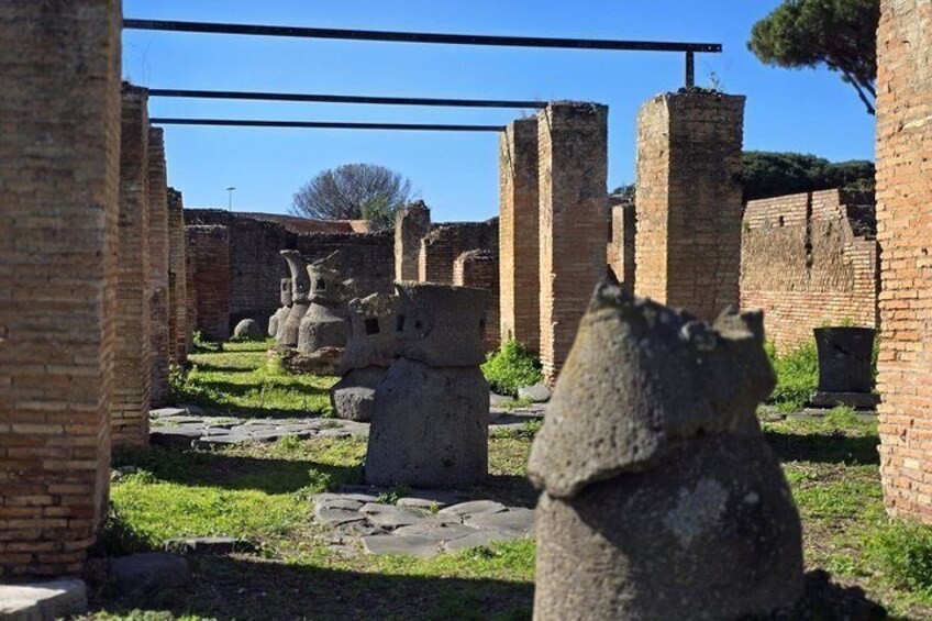 Ancient ruins with stone columns and brick walls. 3