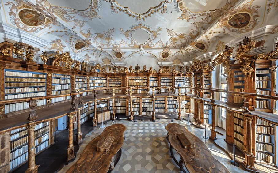 An ornate library with high ceilings, intricate woodwork, and classical architecture. 3