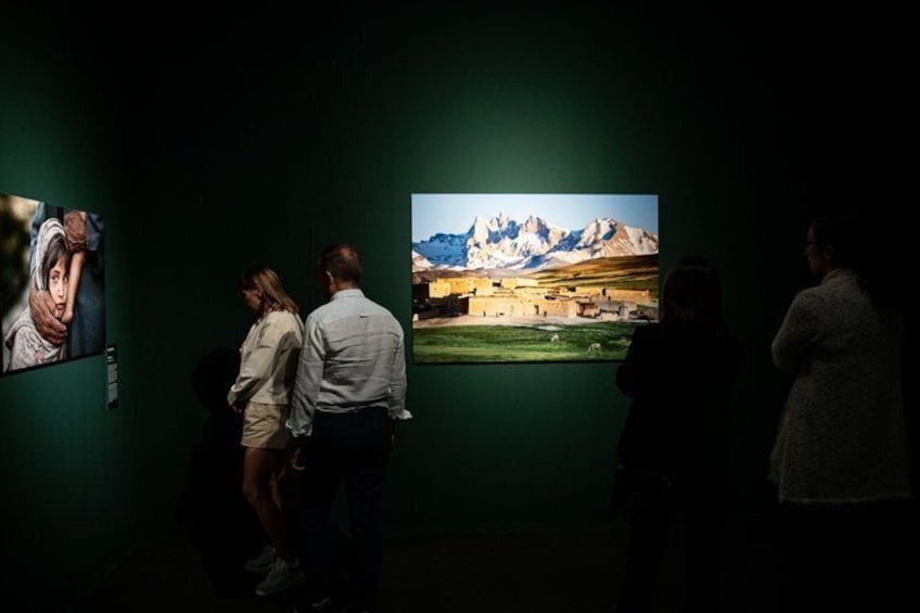 An art gallery with paintings on display. 5
