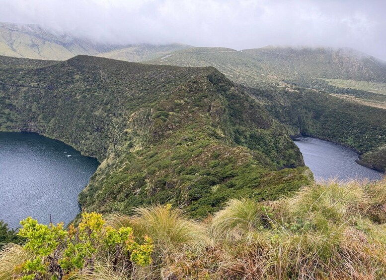 A mountainous landscape with a river cutting through it. 3