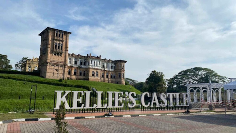 Kelley's Castle with a large sign in front. 1