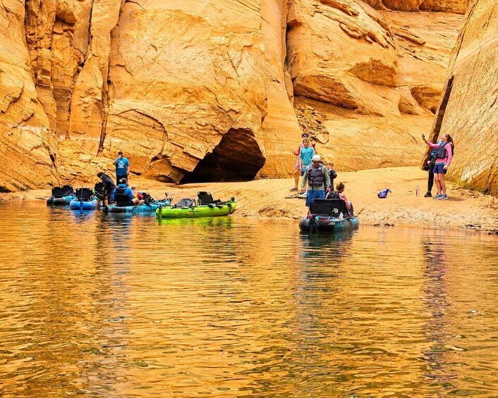 People rafting in a canyon with rocky walls. 1