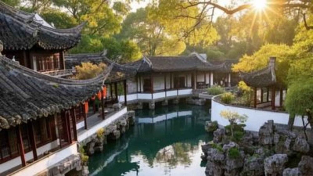 A traditional courtyard with tiled roofs and a central pond. 1