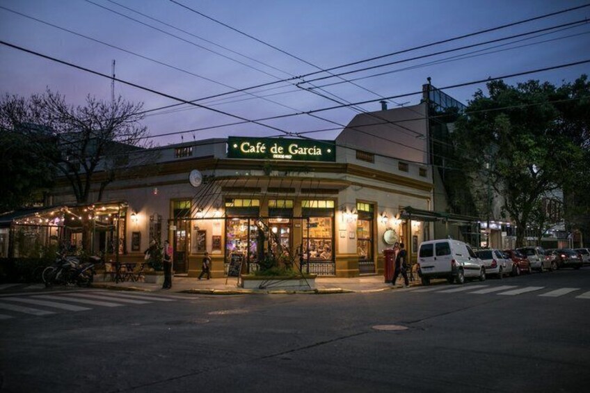 A café named Café de Garcia with outdoor seating and a street view. 5