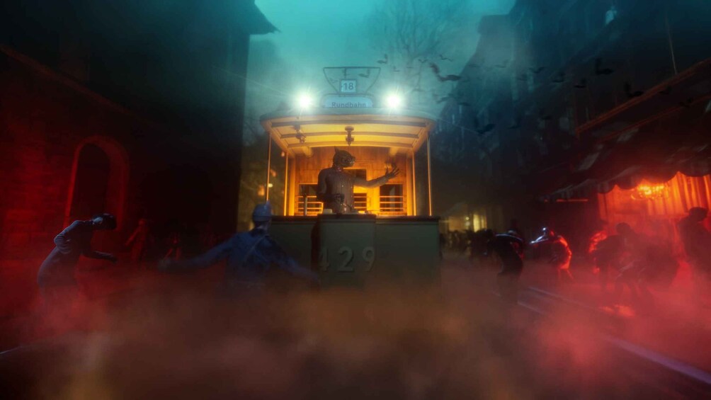 Un bâtiment faiblement éclairé, avec une statue au centre, entouré de brouillard et baigné d’une lumière rouge. 5