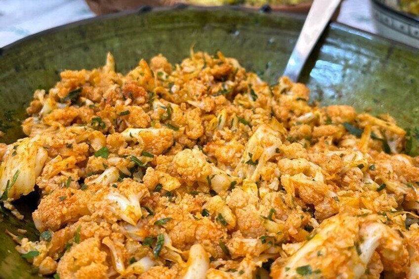 A large bowl of seasoned cauliflower. 3