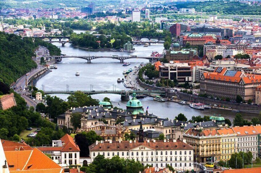 A river with bridges, historic buildings, and a cityscape. 5