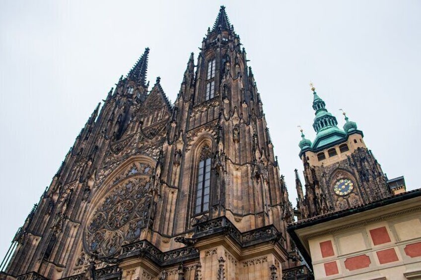 A Gothic cathedral with intricate architecture and a clock tower. 4