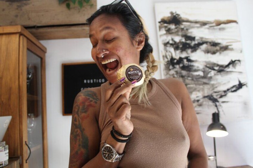 A person holding a product with a label. 3