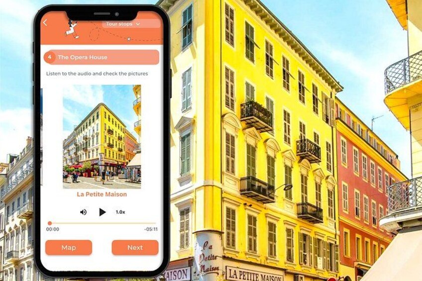 A smartphone displaying a travel app with a street view of colorful buildings. 5