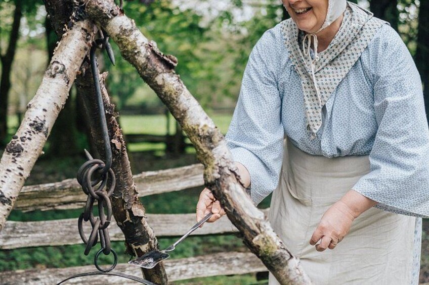 A person cutting a branch with a knife. 5