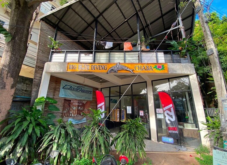 A storefront with a sign reading 'Big Blue Diving' and 'Chaba.' 3