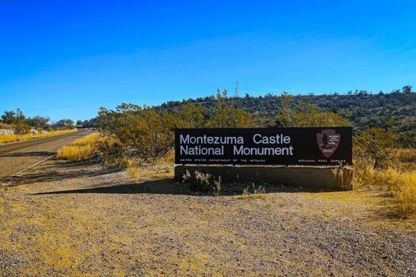 A sign for the Montezuma Castle National Monument. 1