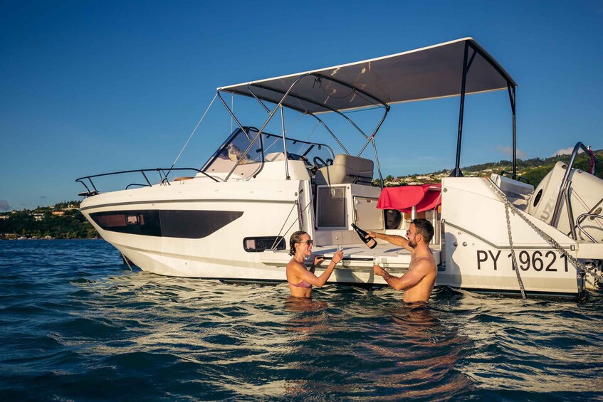 A white yacht with the registration PY 19621 on the water. 2