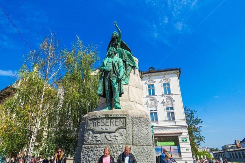 A statue of a historical figure on a pedestal with the inscription 'PRESERVE.' 3