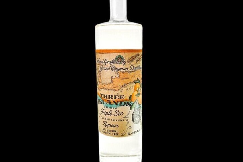 A bottle of Three Islands Triple Sec liqueur with a vintage label. 3