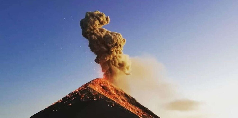 A volcano with a plume of ash and smoke. 4