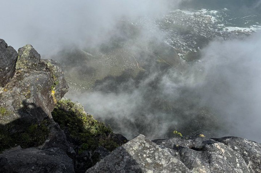 A rocky coastline with mist and waves. 4