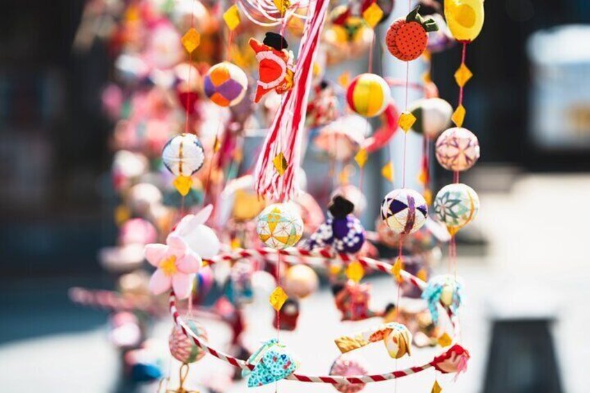 A street with colorful hanging decorations. 3