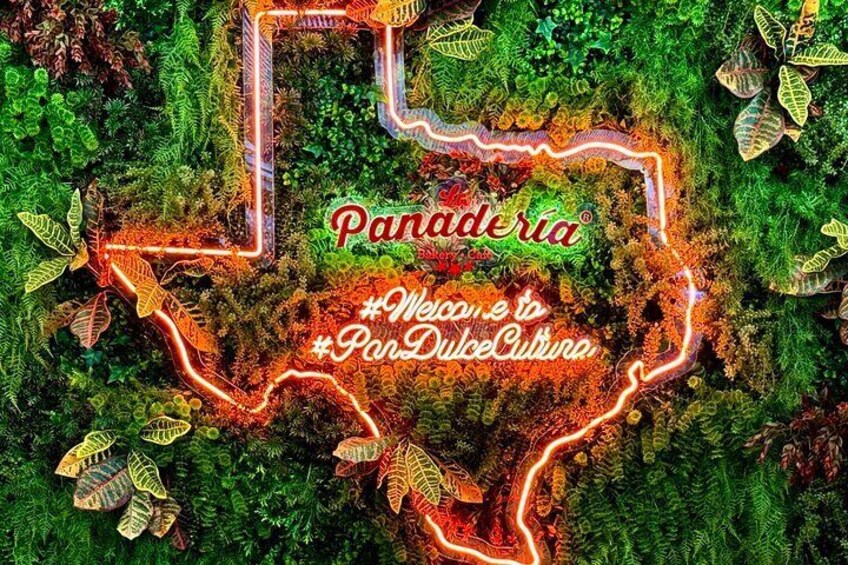 A neon-lit map of a region with the text 'Panadera' and '#Welcome to Pan Dulce Cultura.' 4