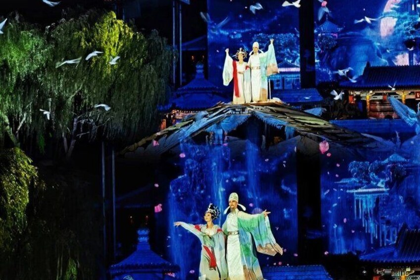 A traditional Asian temple with a pagoda, a hanging garden, and a waterfall. 5