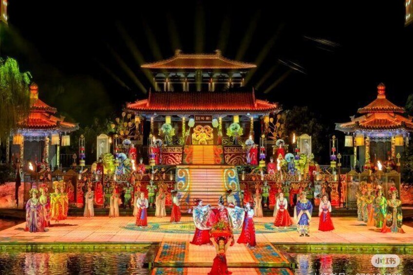 A traditional Chinese temple with ornate decorations and a group of performers in colorful costumes. 1
