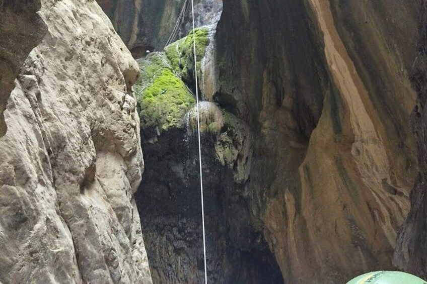 A rock formation with a rope bridge. 2