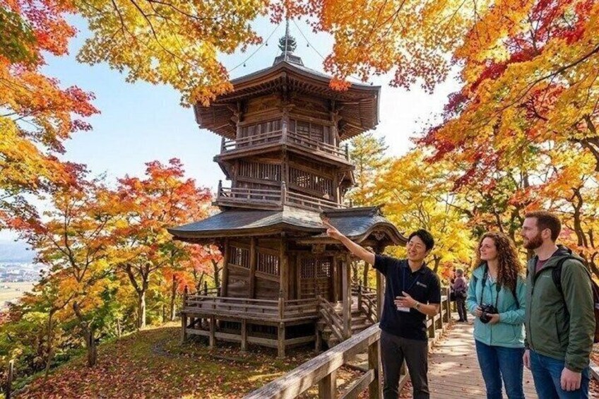 A traditional Japanese pagoda surrounded by autumn foliage. 1