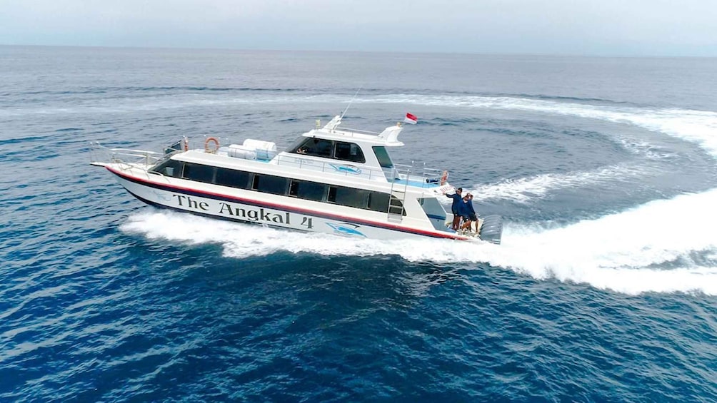 A boat named 'The Anakal 4' on the ocean. 2