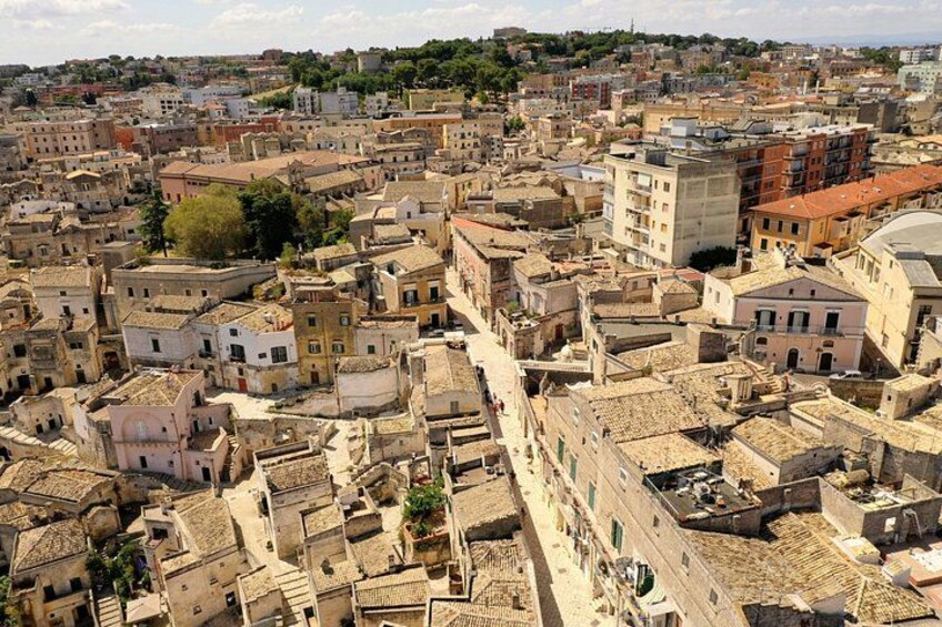 A densely packed urban area with historic buildings and narrow streets. 2