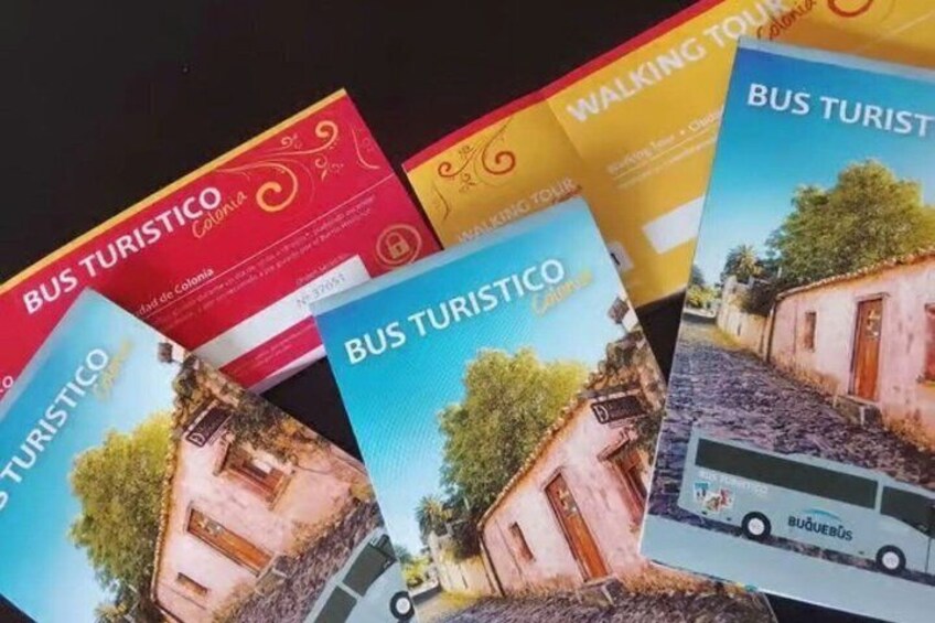 Brochures titled 'BUS TURISTICO' with images of rural buildings and a bus. 5