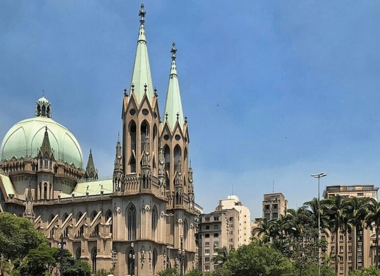 A historic cathedral with twin spires and a large dome. 2