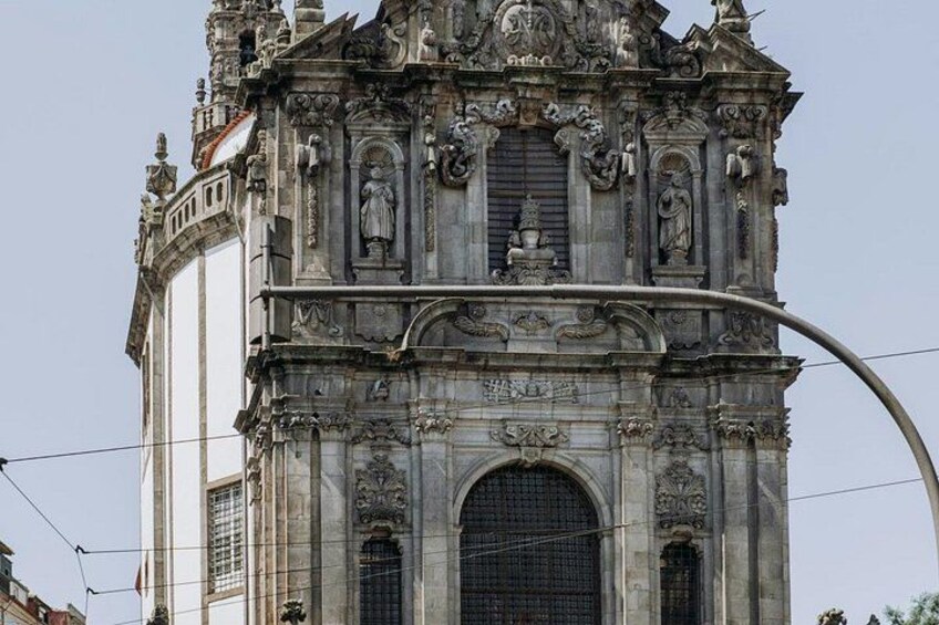 A historic church with intricate stone carvings and a large arched doorway. 3