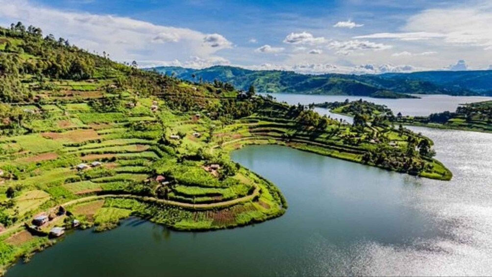 Terraced fields, a lake, and distant mountains. 4