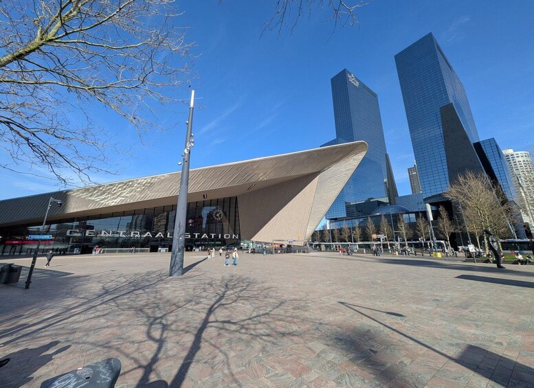 Central Station with modern architecture and surrounding tall buildings. 1