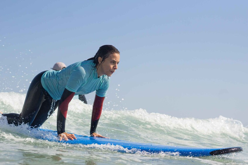A person surfing on a wave. 3
