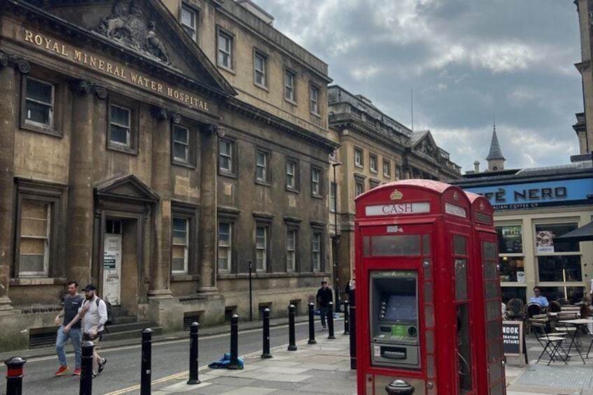 A red British telephone booth in front of the Royal Mineral Water Hospital. 5