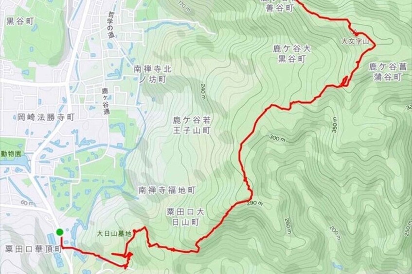 A topographic map with contour lines indicating elevation changes, marked towns, and a red trail. 4