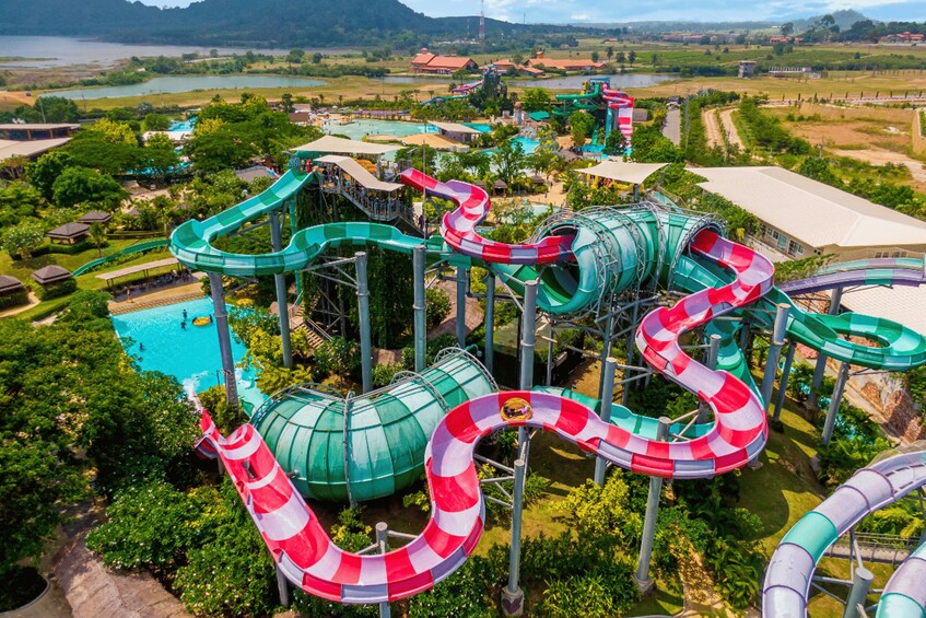 A water park with multiple water slides and a pool area. 3