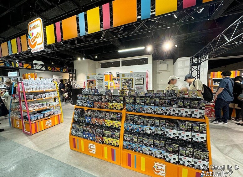 A colorful store interior with shelves of merchandise and a prominent sign reading 'BANDAI Andy Official Shop'. 4